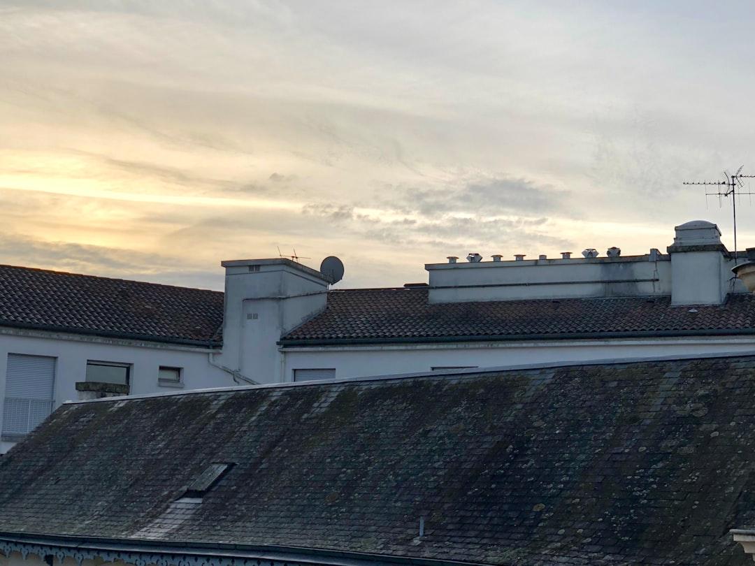 Rooftops of old buildings during sunrise 